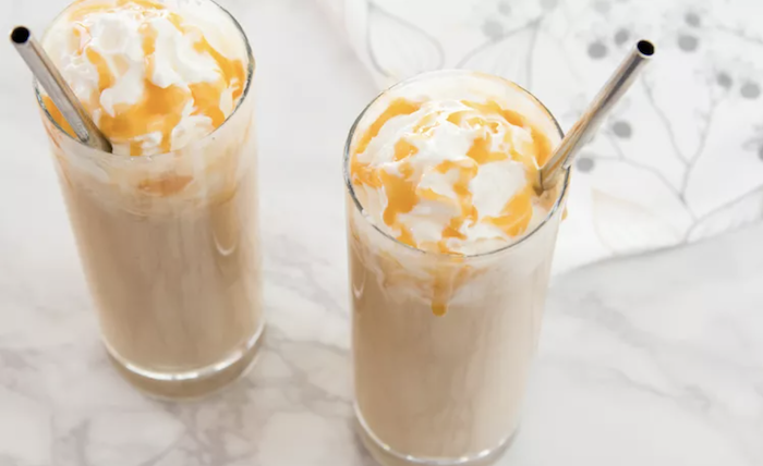 Toffee Frappe Frozen Drink topped with whipped cream and caramel 